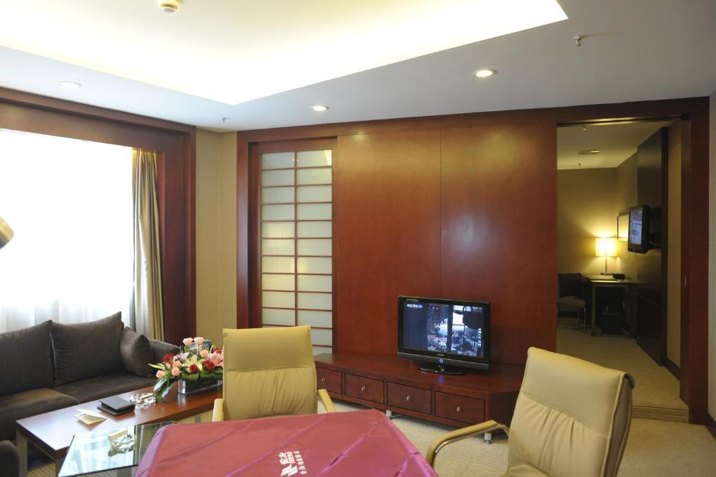 Wuhan Junyi Dynasty Hotel Habitación foto